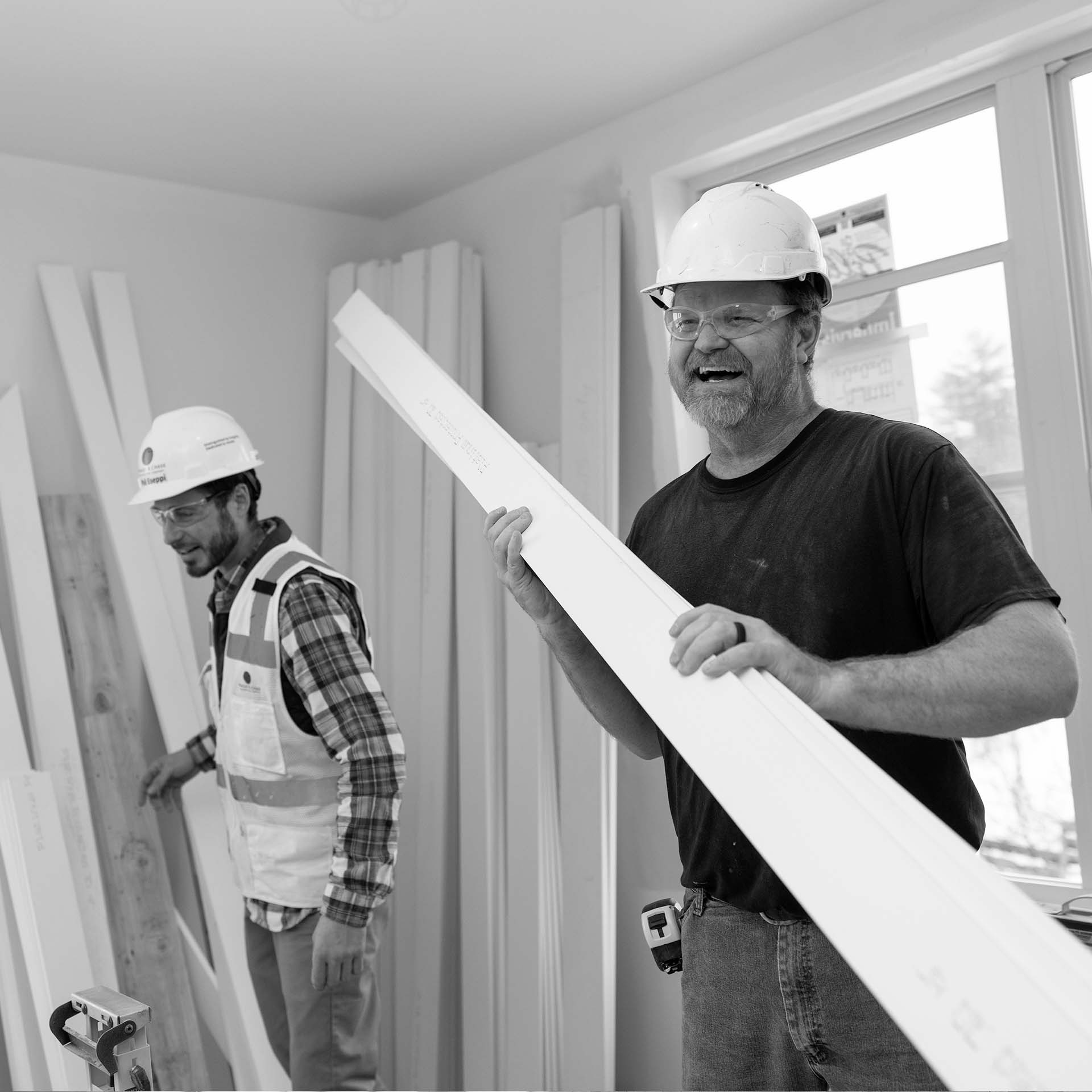 neagley and chase construction worker laughing